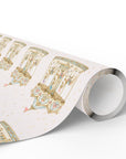roll of wrapping paper in light pink with a carousel pattern and light colored polka dots.
