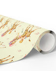Roll of baby boy giraffe gift wrap with a repeating pattern of baby boys riding giraffes in floral bonnets, baby bottles and tiny roses