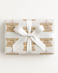 Pink and blue Parisian carousel wrapping paper roll with vintage style merry go round animals and gold scrollwork.