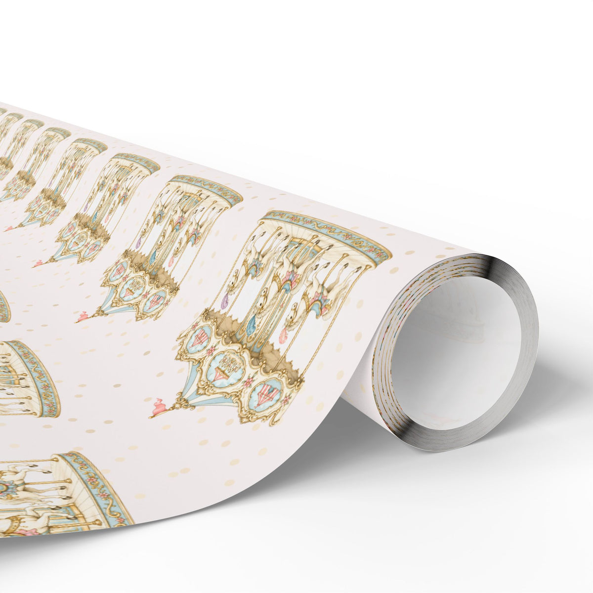 roll of wrapping paper in light pink with a carousel pattern and light colored polka dots.