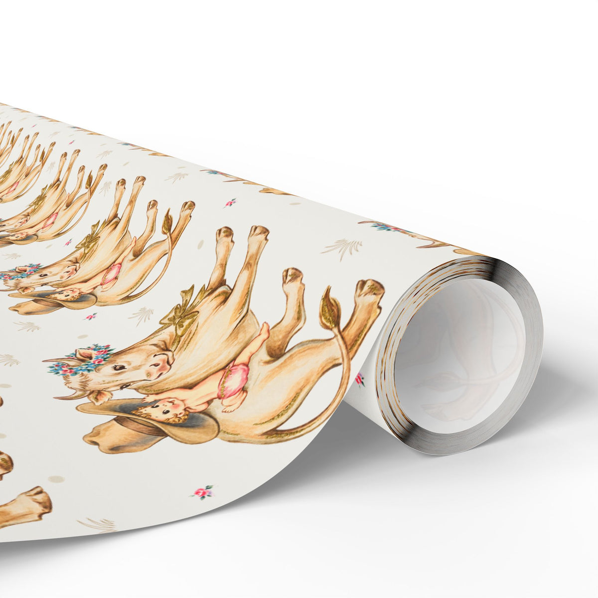 Roll of wrapping paper with golden cows and babies illustration on a light background.