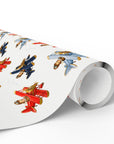 A roll of white wrapping paper featuring a repeating pattern of vintage-style toy airplanes in red, blue, and gold, shown on a clean white background.