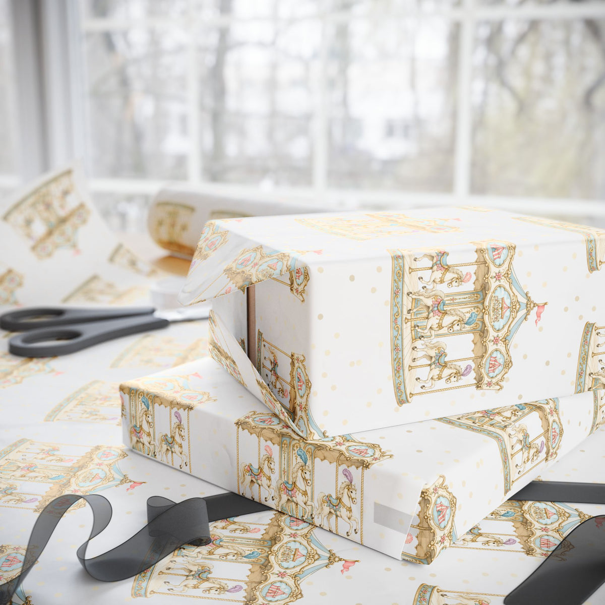 White wrapping paper with a gold carousel illustration pattern, shown wrapped around gift boxes on a table with scissors and ribbon near a window.