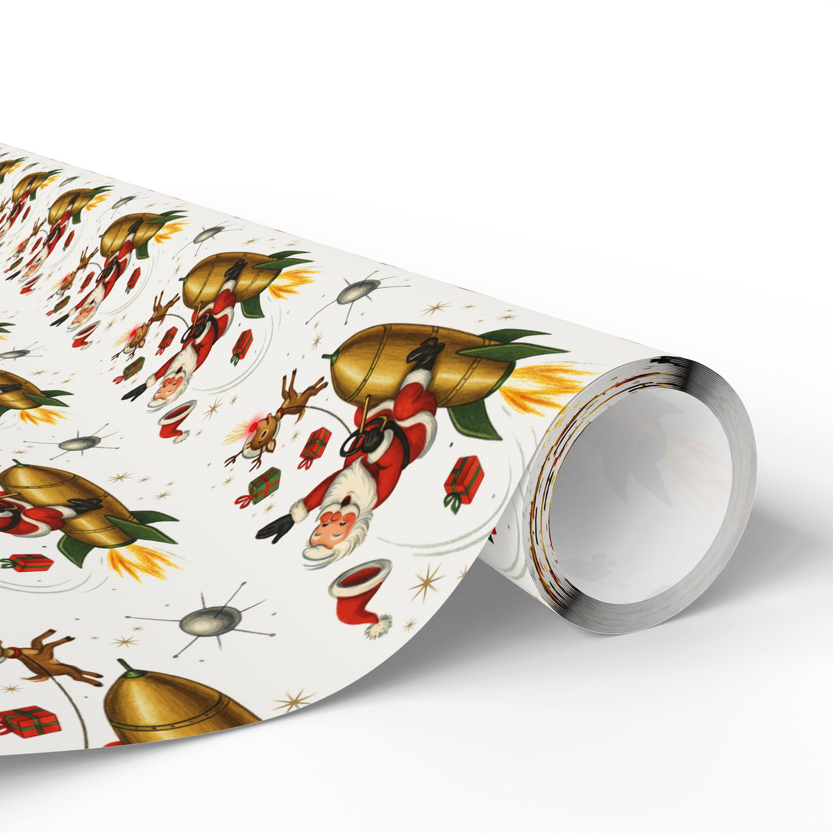 A roll of wrapping paper with a nostalgic Christmas print featuring a space age Santa Claus, golden rockets, reindeer, and small explosions on a white background, shown on a clean white studio background.