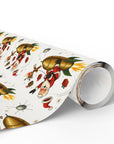 A roll of wrapping paper with a nostalgic Christmas print featuring a space age Santa Claus, golden rockets, reindeer, and small explosions on a white background, shown on a clean white studio background.