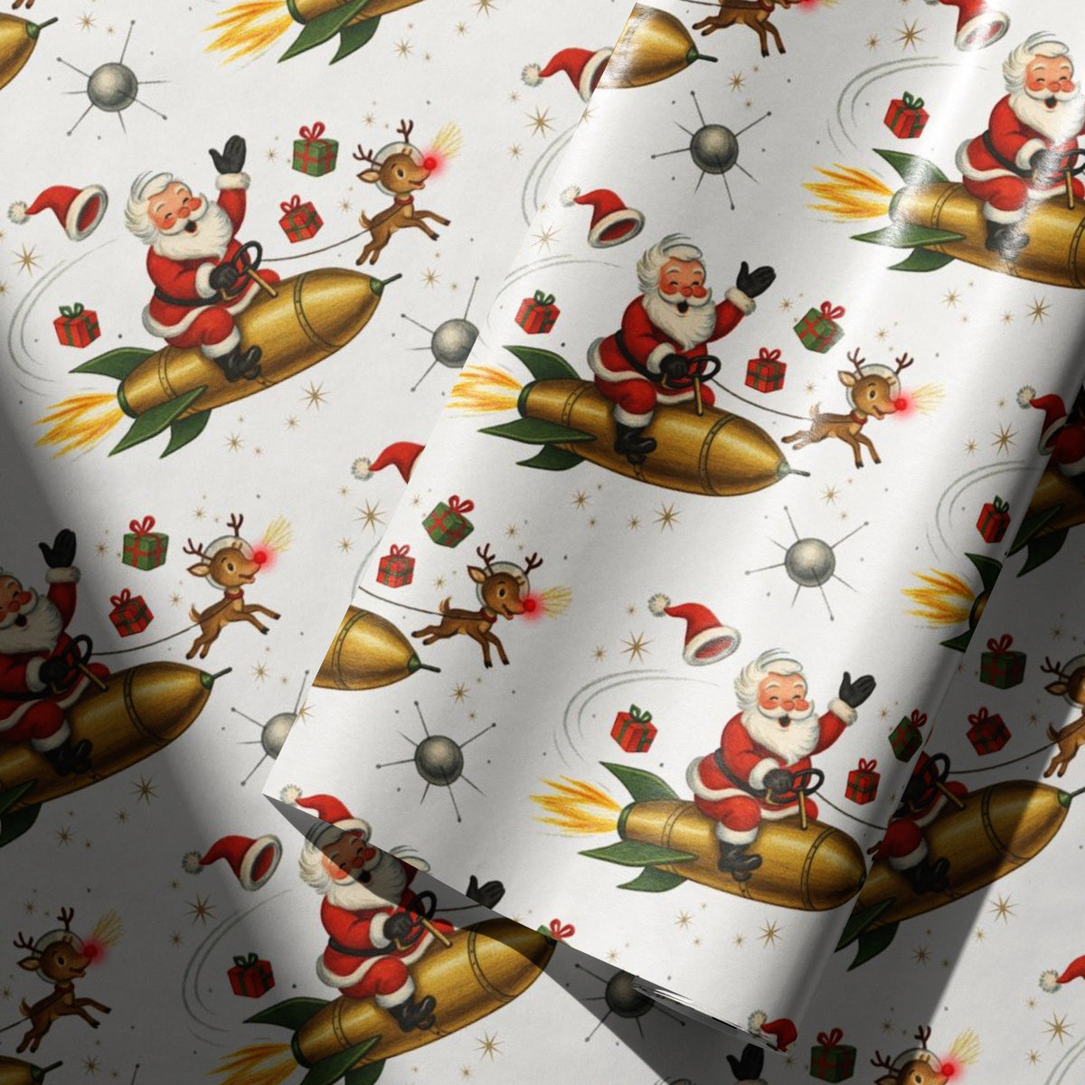 Ivory wrapping paper with a festive Christmas pattern featuring Santa Claus riding gold rockets, accompanied by reindeer, gifts, and snow globes, shown with soft folds and shadows.