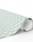 A roll of wrapping paper with a aquamarine and soft white checkerboard pattern, shown partially unrolled on a clean white background.