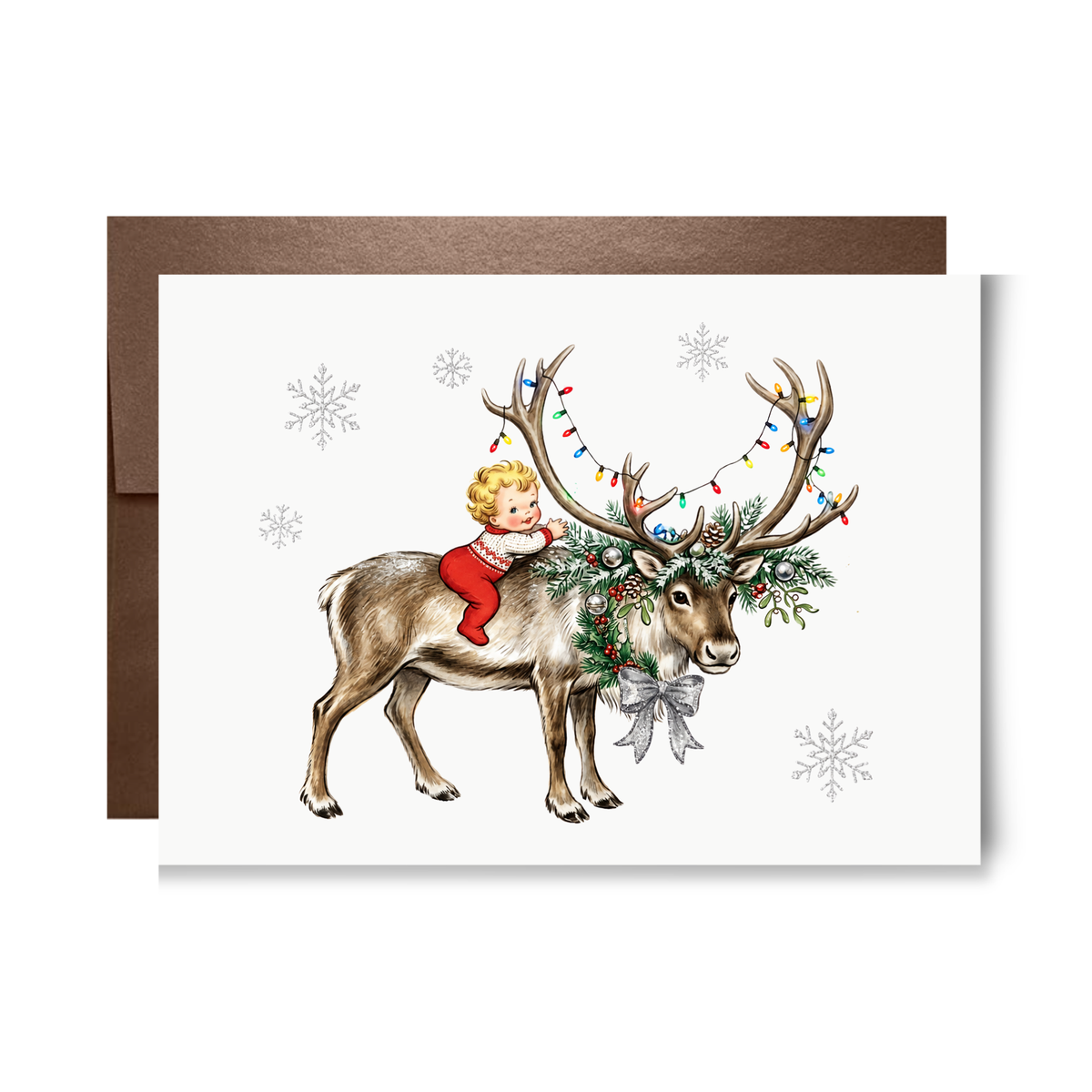 Vintage-style baby in red pajamas hugging a reindeer with antlers strung in multicolor Christmas lights and a pine wreath, baby's first Christmas card