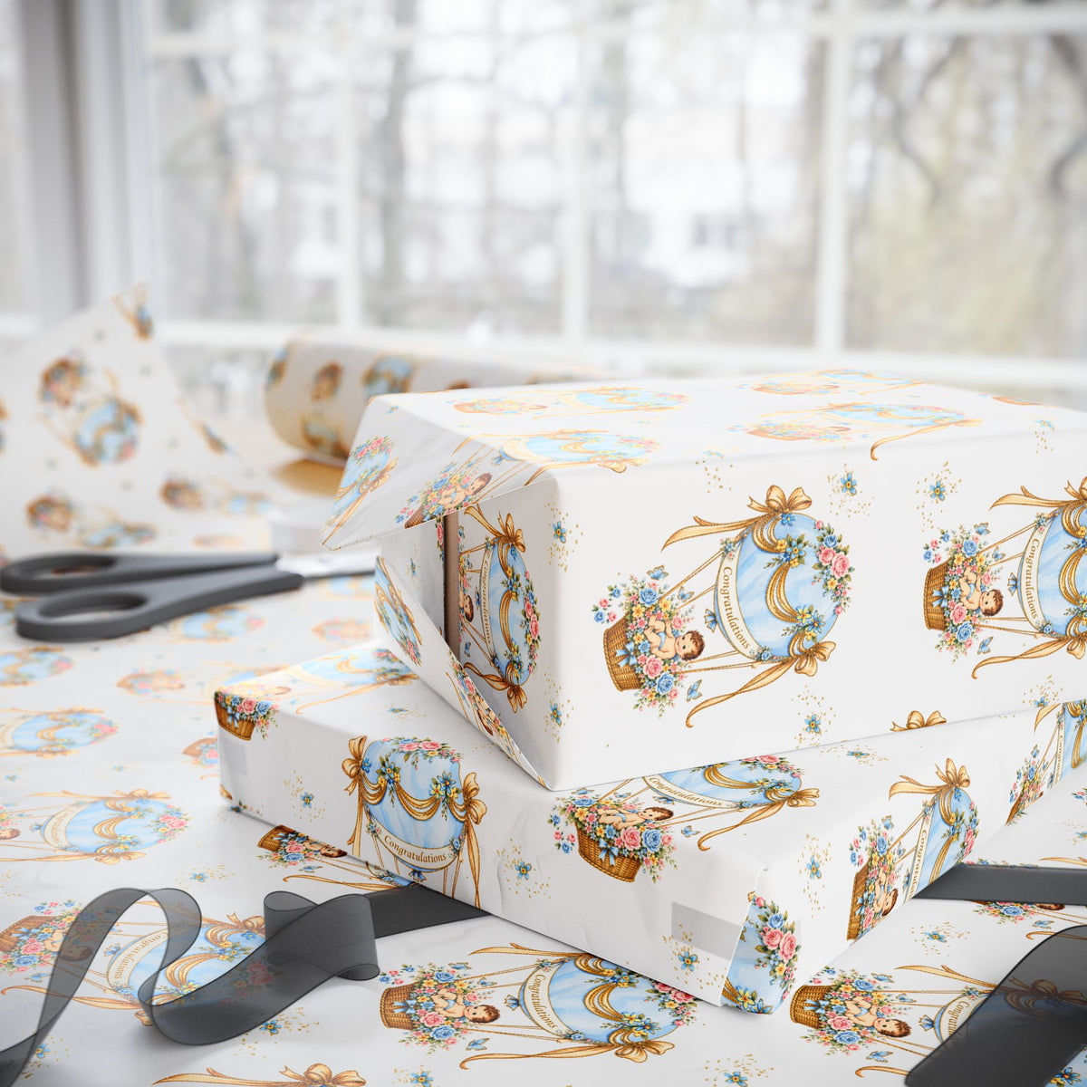 Baby gifts wrapped in paper featuring blue hot air balloons and baby boys.