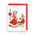 Vintage-style baby's first Christmas card: a woman in a red coat trimmed with white fur pushes a pram with one sleepy baby past a wreath-trimmed lamppost, shown with a red envelope, Baby It's Cold Outside baby shower card