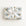 A rectangular gift box wrapped in white paper with a repeating pattern of vintage blue airplanes carrying a boy pilot, tied with a wide white ribbon and bow, on a light off-white background.