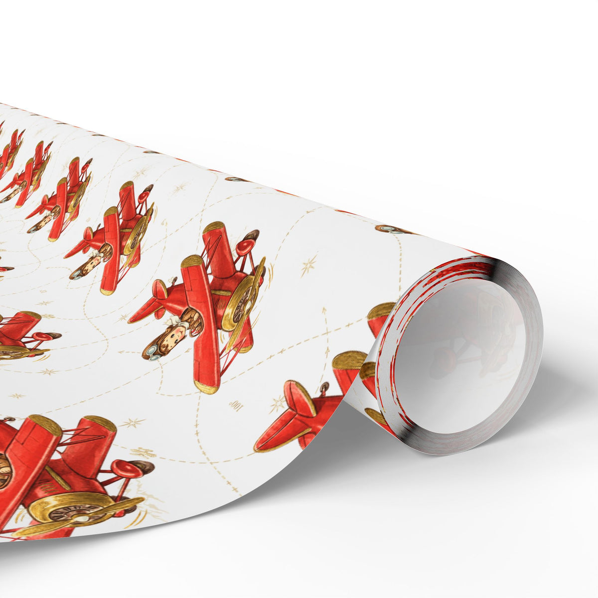 A roll of wrapping paper featuring a repeating pattern of red airplanes piloted by darling baby boys against a soft background with delicate navigation lines and compass roses.