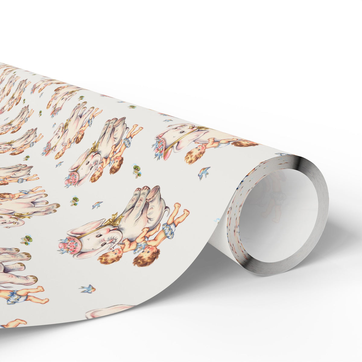 A roll of wrapping paper with a vintage-style watercolor illustration of babies climbing on elephants shown partially unrolled.