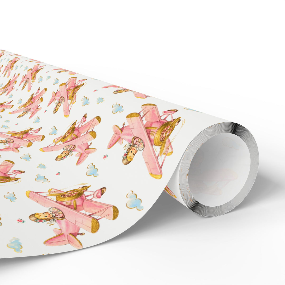 Roll of girl airplane wrapping paper featuring a repeating pastel pink vintage biplane pattern.