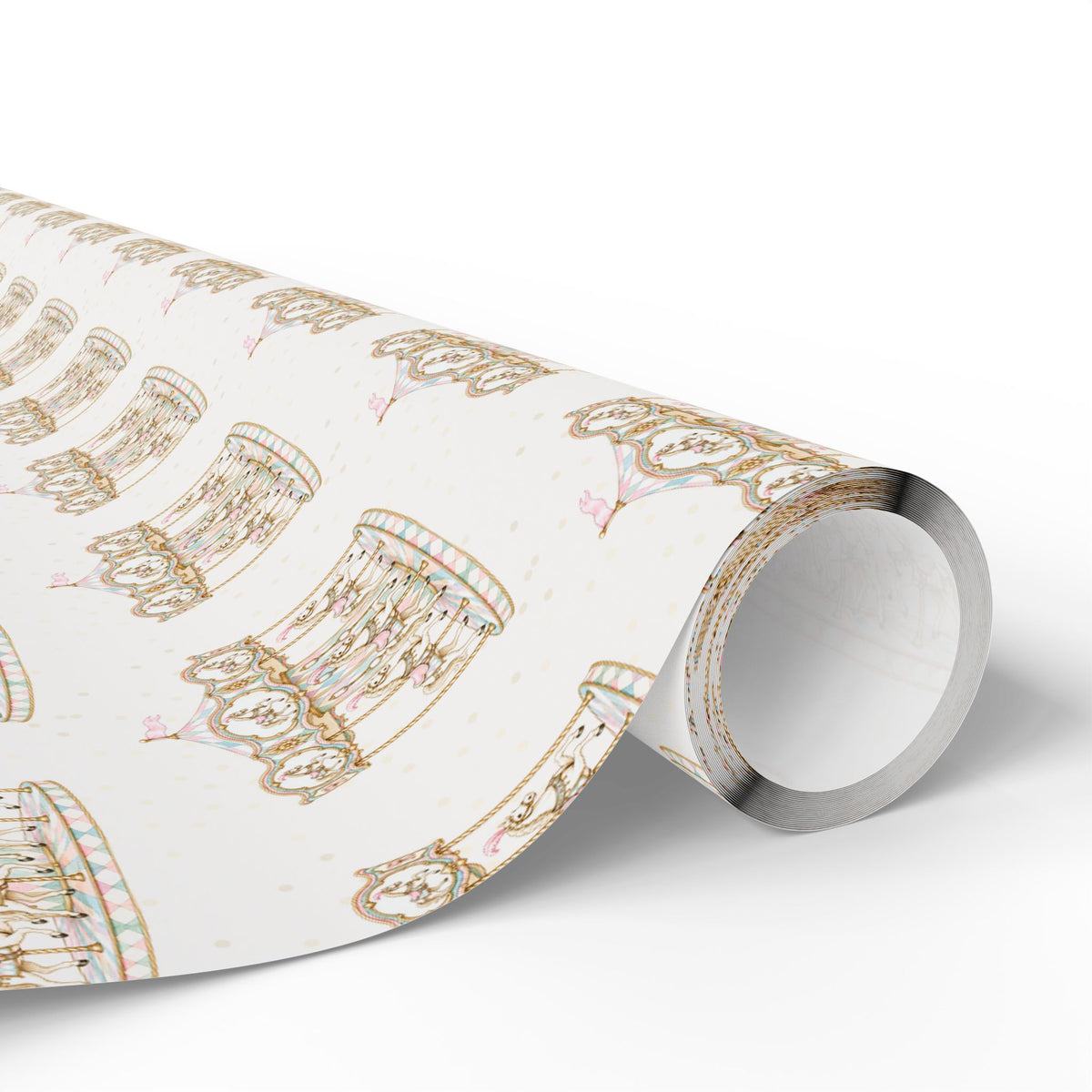A roll of wrapping paper with a repeating pattern of ornate gold and pink carousel horses on a white background, shown partially unrolled on a clean white surface.