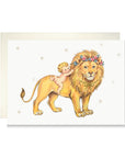 Vintage-style lion new baby card with a curly-haired baby riding a gentle lion wearing a flower crown, surrounded by tiny stars