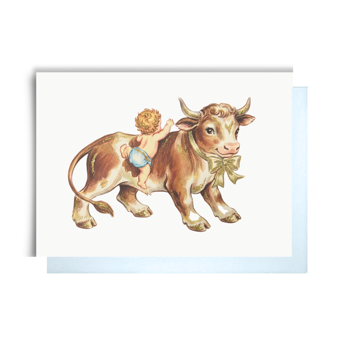 Vintage-style new baby boy card with a baby in blue climbing on a friendly brown and white cow wearing a big bow.