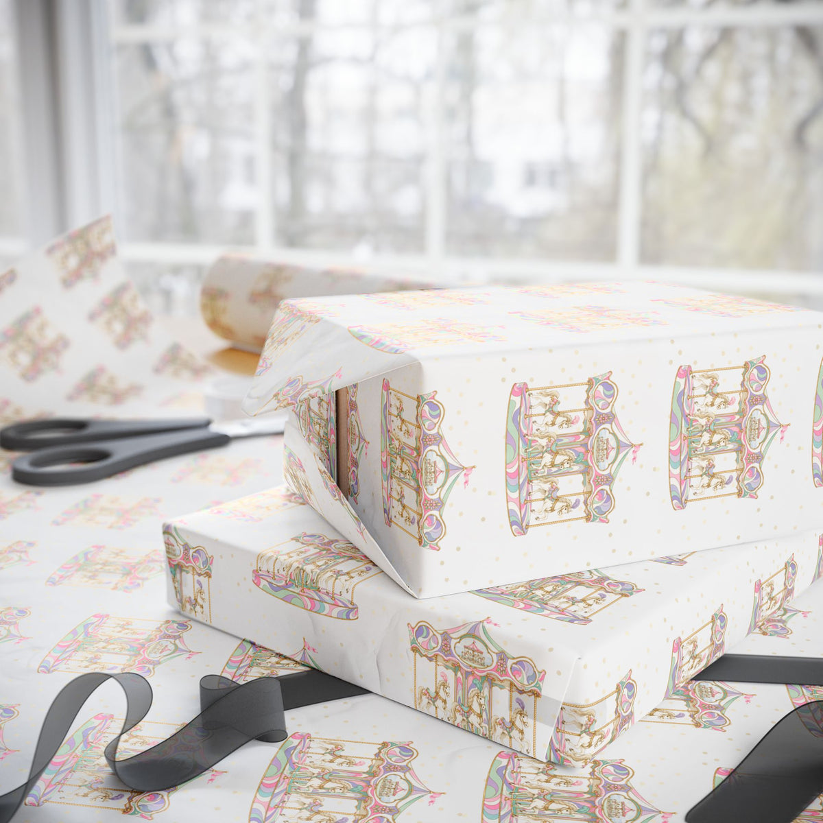Ivory wrapping paper with a vintage carousel print, shown wrapped around gift boxes on a table with scissors and ribbons in front of a softly blurred window.