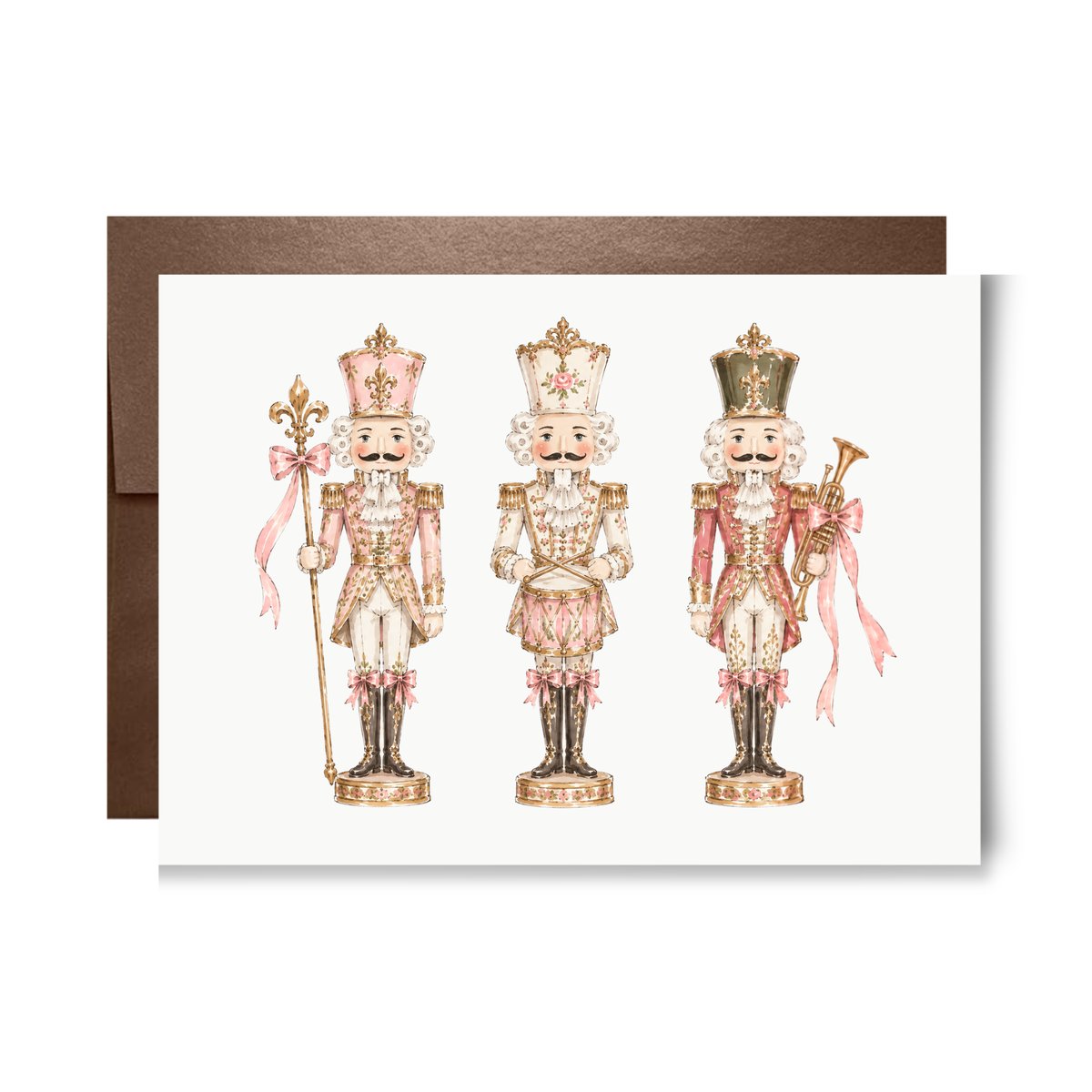 Vintage-style trio of blush pink and cream nutcracker soldiers with pink ribbon bows, pink nutcracker Christmas card