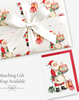 Vintage-style Santa first birthday card with matching Christmas birthday gift wrap, Santa holding a cake with a number one candle, tied with white satin ribbon