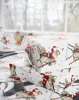 Christmas-themed wrapping paper with a vintage Santa Claus on a horse playing polo, shown wrapped around gift boxes on a table near a window.