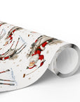 A roll of wrapping paper featuring a whimsical illustration of Santa Claus playing polo in the snow on a white background.