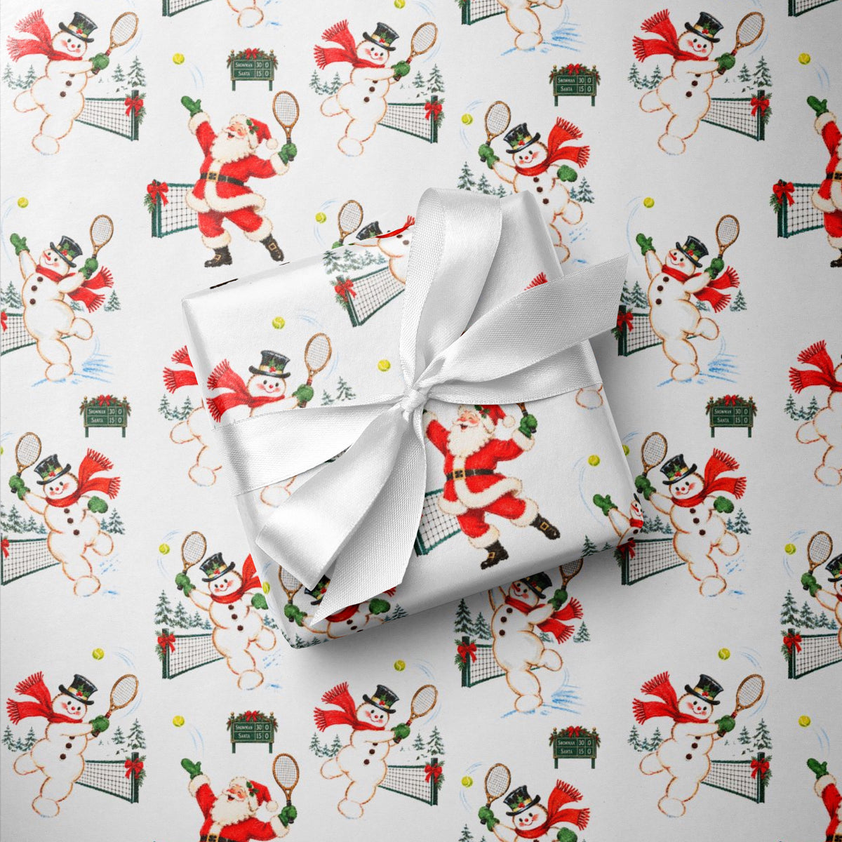 Gift wrapped in vintage-style Christmas wrapping paper with Santa and snowmen playing tennis and a white satin bow, Santa tennis gift wrap