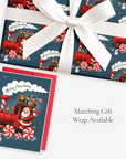 Vintage-style Santa steam train Christmas card with matching red train gift wrap, tied with white satin ribbon