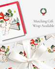 Vintage-style snowman pickleball Christmas card with matching pickleball snowman gift wrap, tied with white satin ribbon