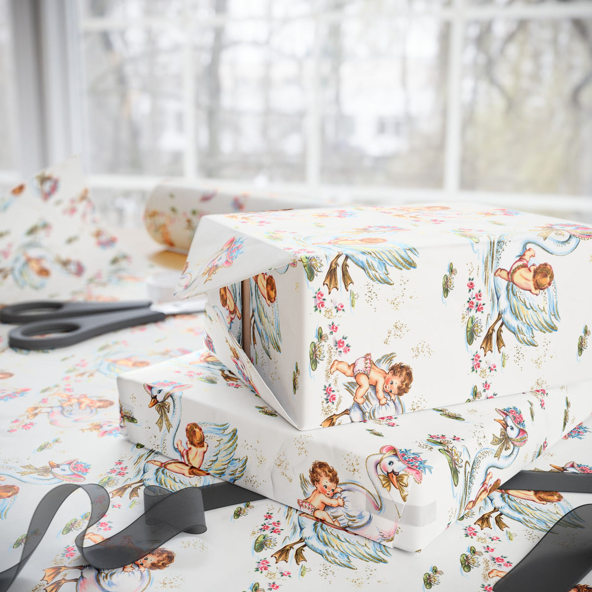 Gift boxes wrapped in vintage-style swan wrapping paper with darling babies hopping on for a ride amongst lily pads.