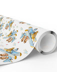 Roll of twin boys airplane wrapping paper featuring a repeating blue vintage biplane pattern.