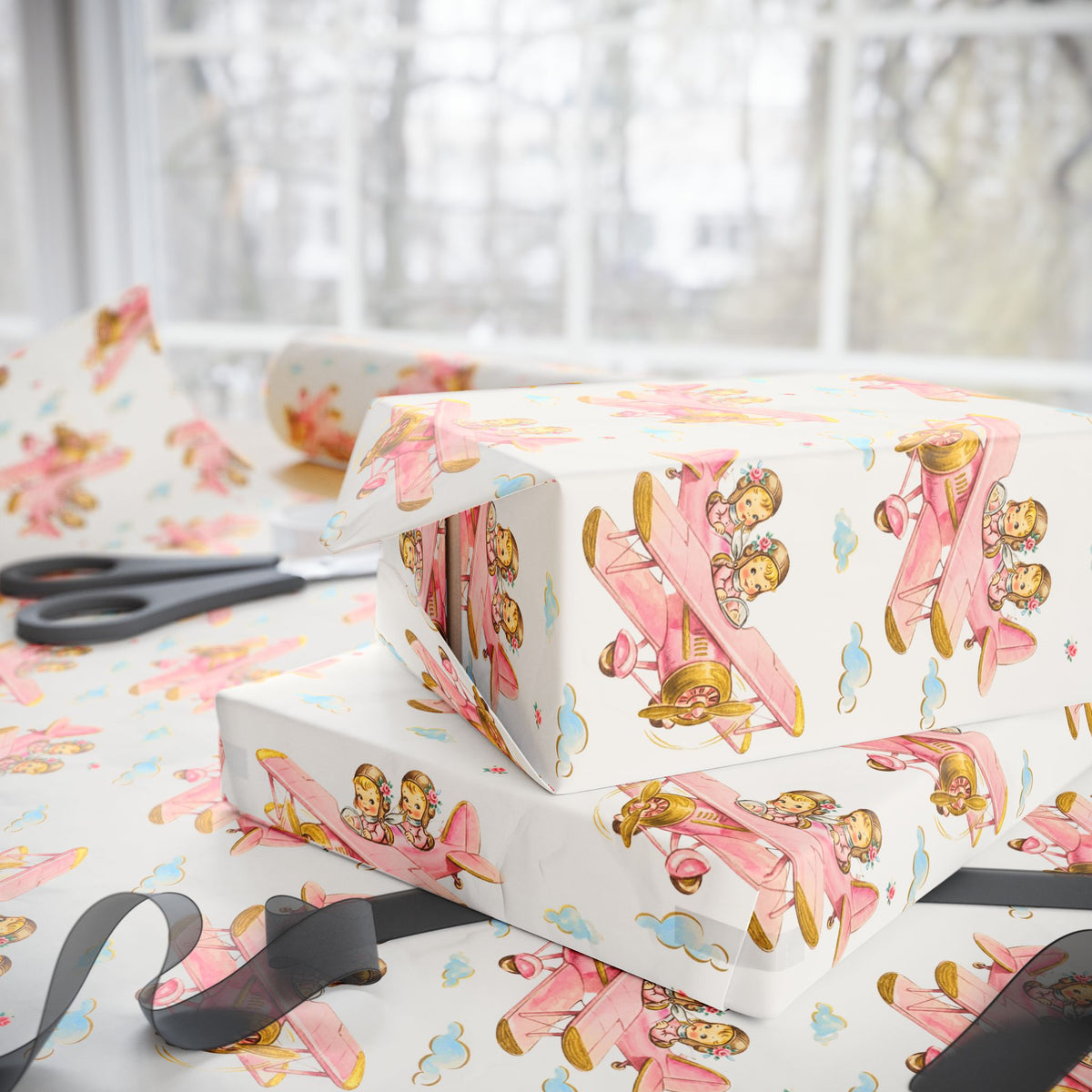 Gift wrap featuring vintage-style twin girls piloting a airplane on a light background.