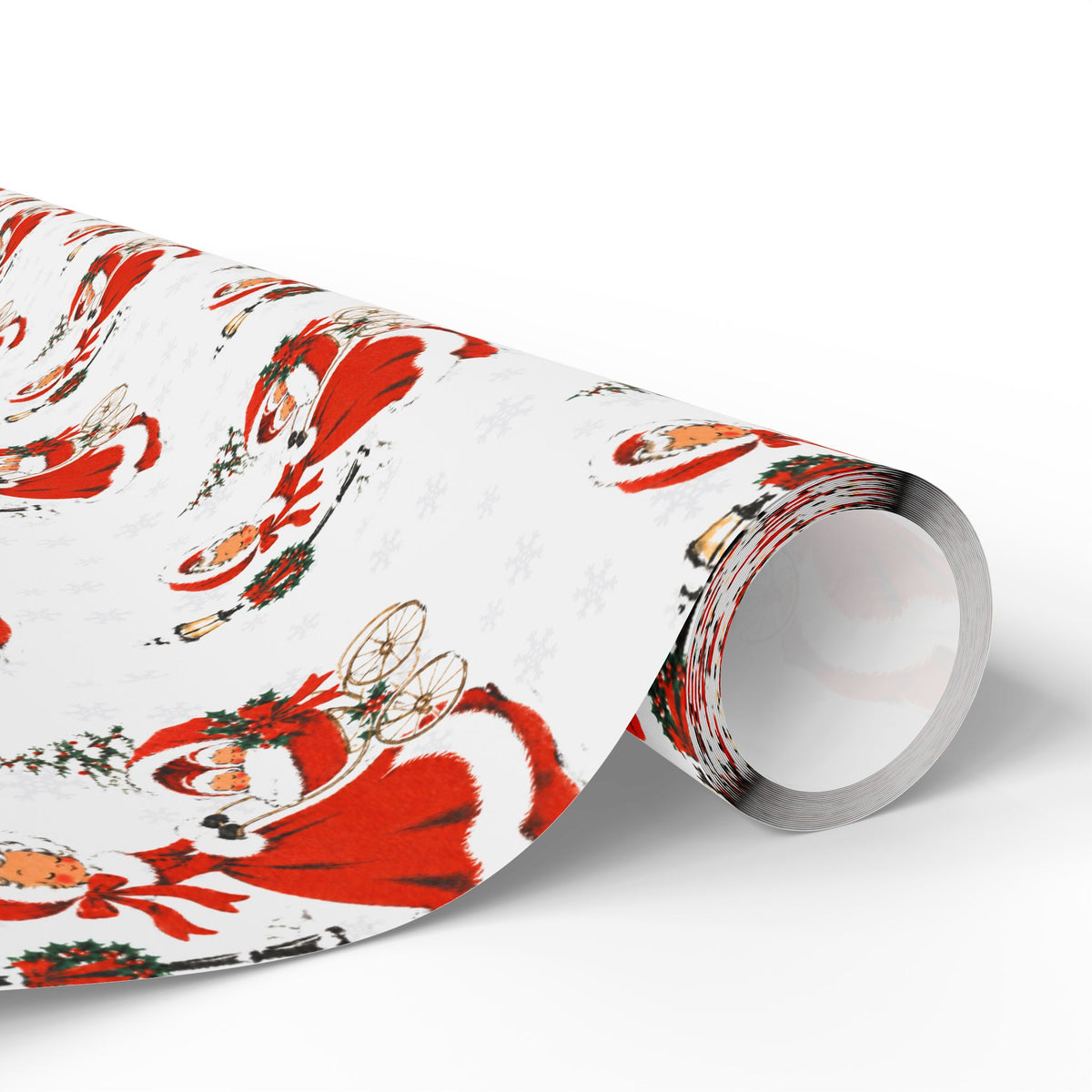 A roll of vintage-style twins first Christmas wrapping paper with a repeating pattern of a woman in a red coat trimmed with white fur pushing a pram with two sleepy babies, wreath-trimmed lampposts and snowy fir trees on a white background, Double the Joy twin baby shower gift wrap