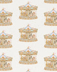 Pink and blue carousel patterned wrapping paper with vintage style merry go round animals.