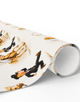 Western bridal shower wrapping paper roll featuring a vintage-inspired bride and groom chase scene on a cream background, wrapped with a white ribbon.