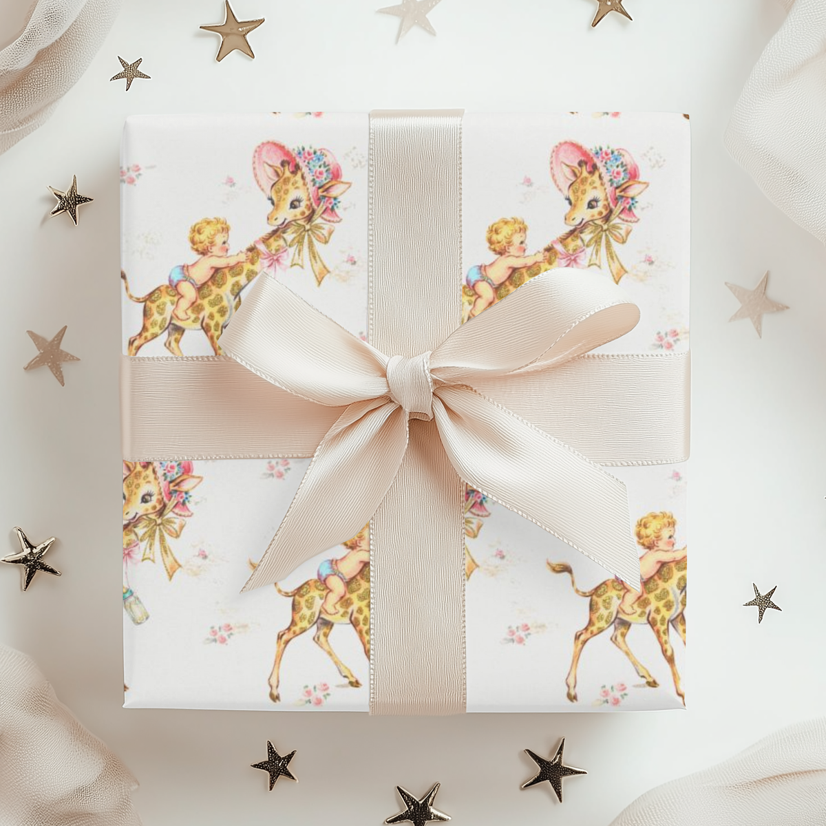 Wild one first birthday gift wrapped in safari giraffe wrapping paper with a cream ribbon bow and scattered stars